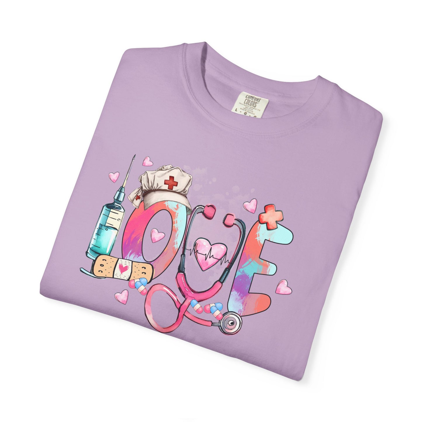Purple t-shirt with colorful 'LOVE' design featuring a stethoscope, syringe, and nurse's hat on a white background.