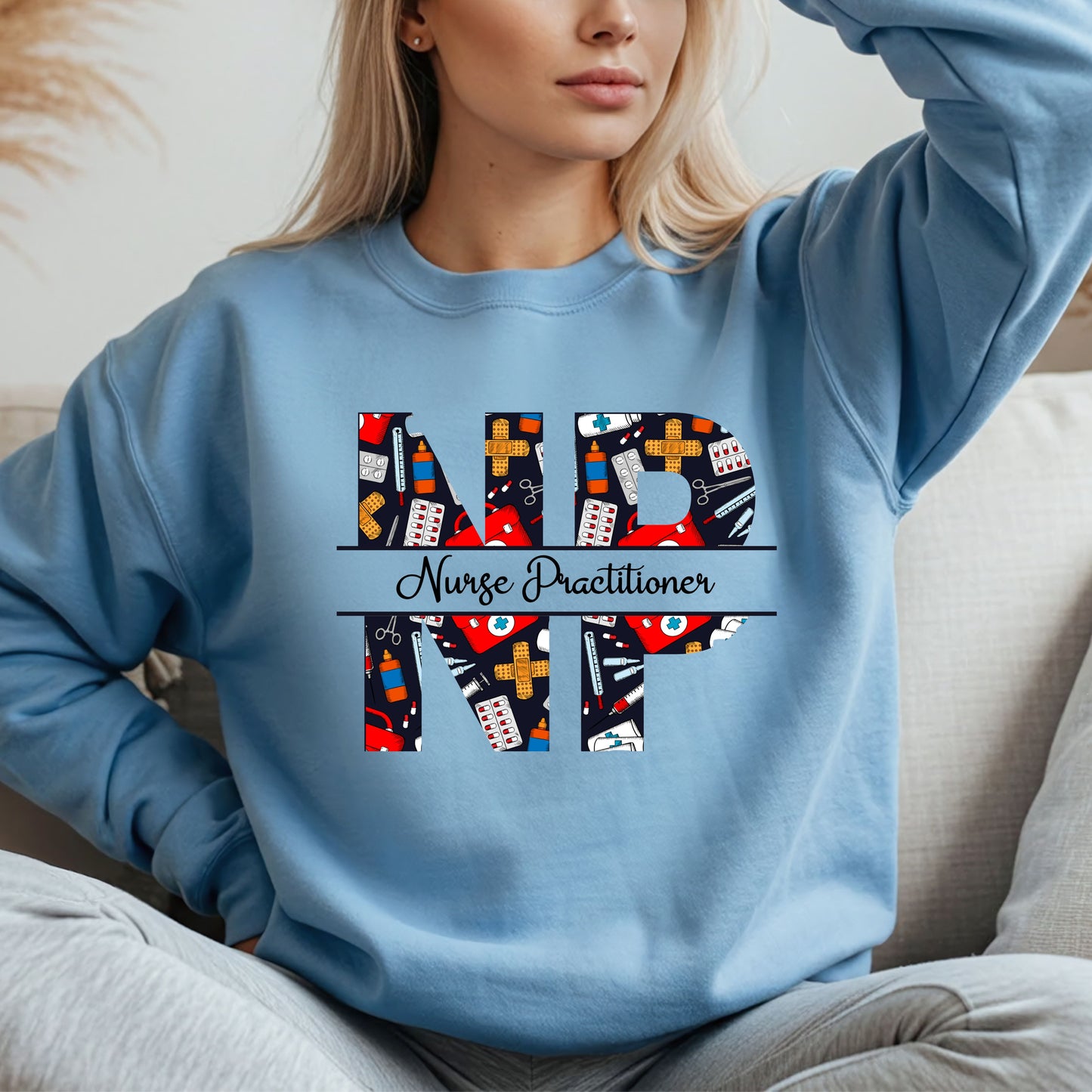 Light blue sweatshirt with 'NP' Nurse Practitioner' design.