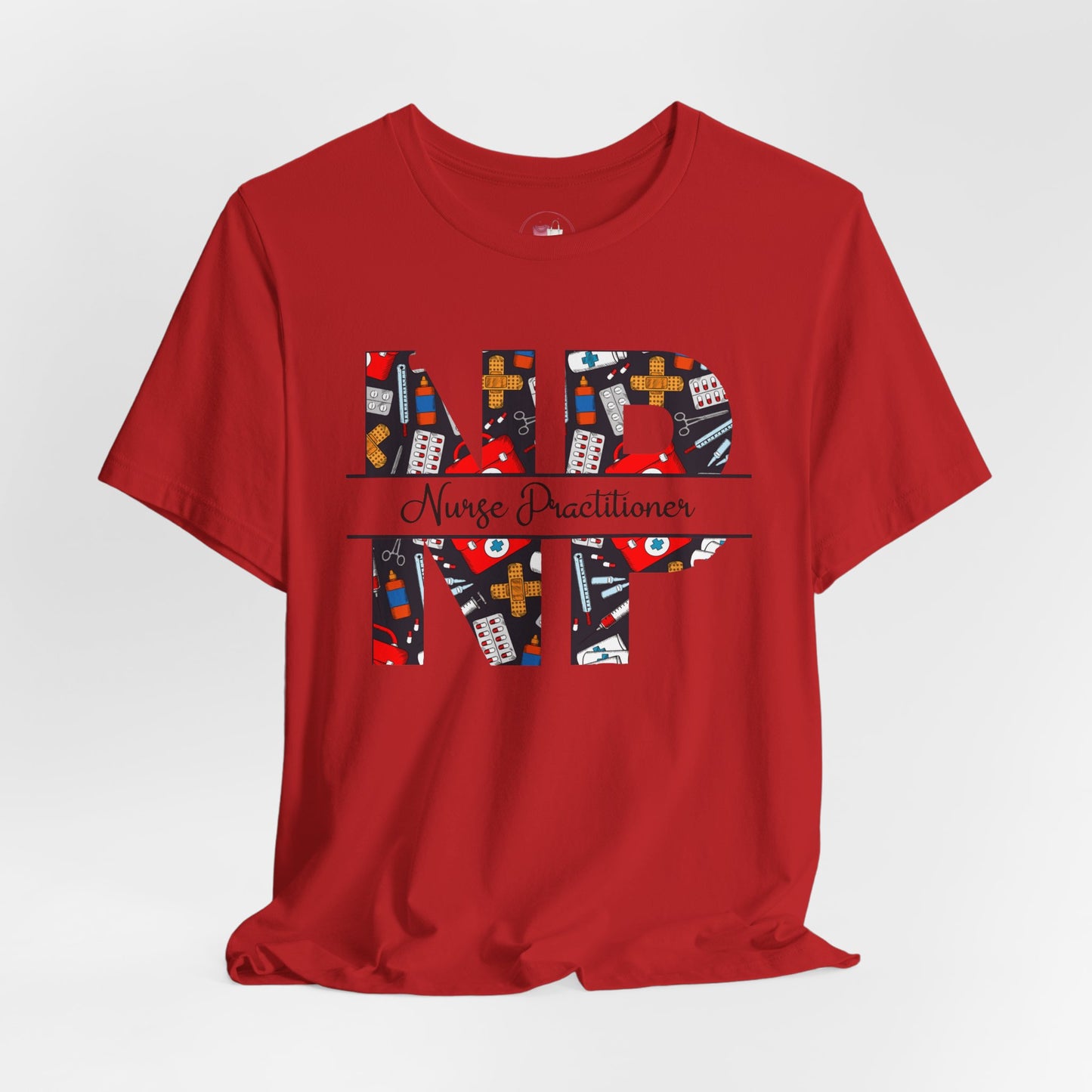 Red t-shirt with colorful 'NP' Nurse Practitioner' design on a light gray background