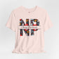 Pink t-shirt with colorful 'NP' Nurse Practitioner' design on a light gray background