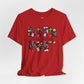 Red t-shirt with colorful 'NP' Nurse Practitioner' design on a light gray background